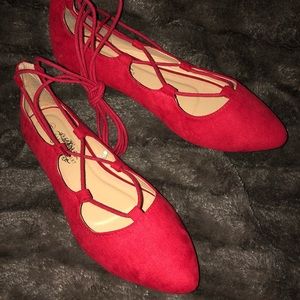 Charles Albert lace up flat.